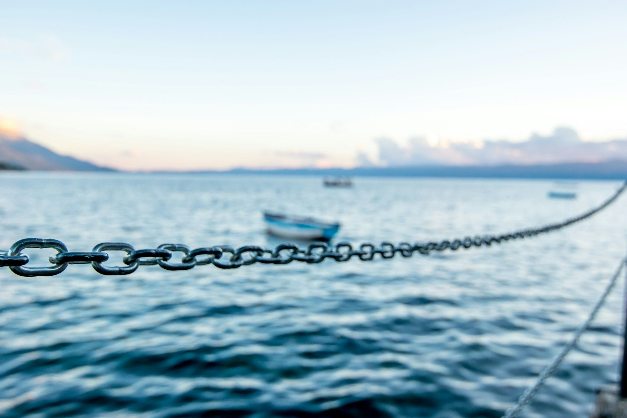 A chain stretched over water